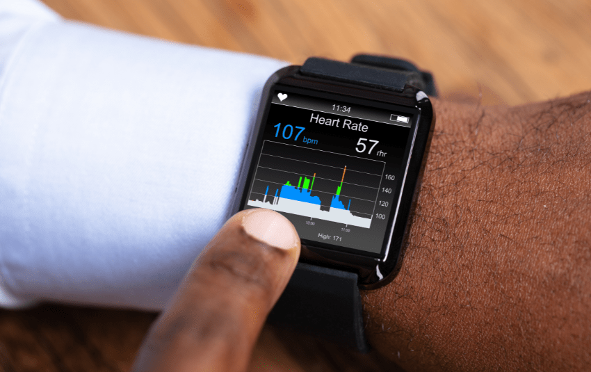 Close up of man's hand wearing a smartwatch