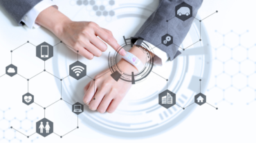 Man touching smartwatch on his wrist with many functions